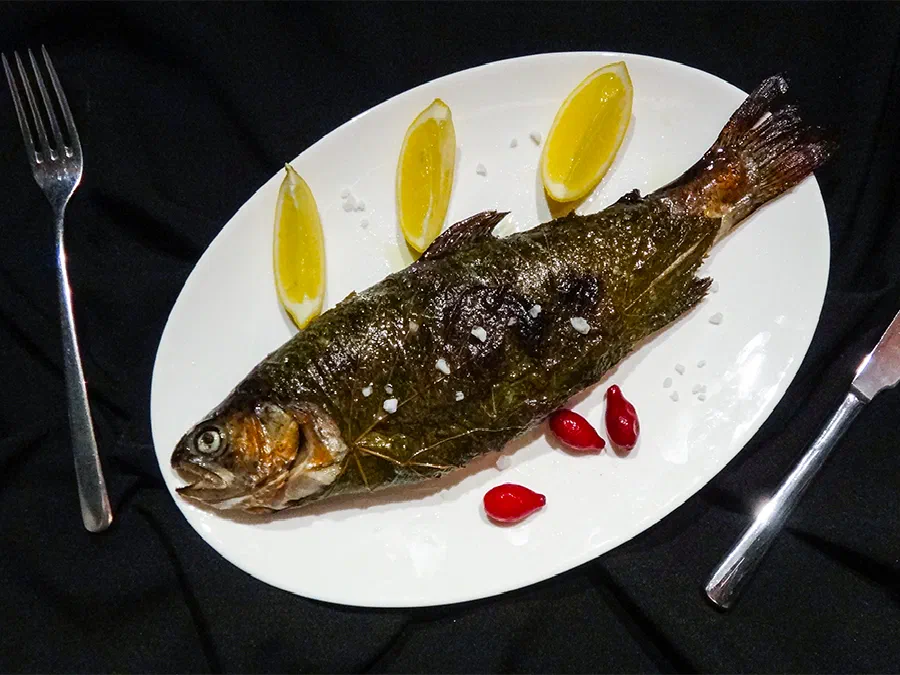 Форель с кизилом в виноградных листьях (Trout with Cornel in Grape Leaves)