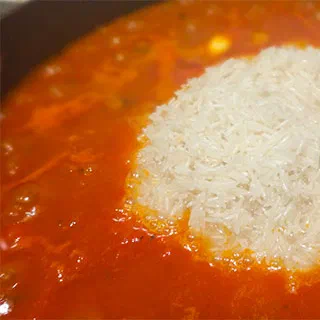 Кухня Ганы: рис с курицей – Жолоф райс (Ghana Jollof Rice)