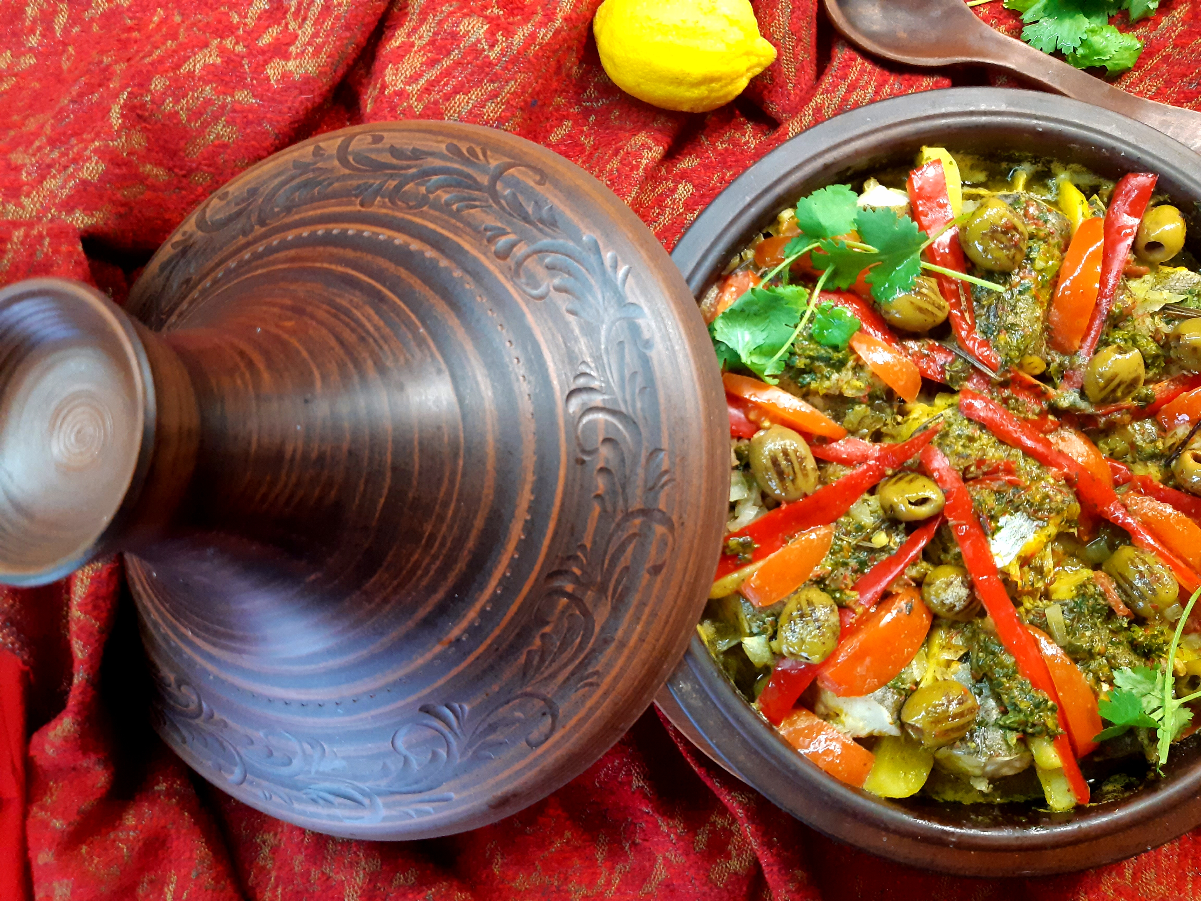 Tagine with white sea fish, potatoes and traditional spices
